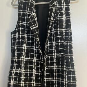 Zoi black and white plaid vest with a touch of elegance